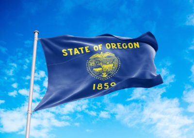 Oregon Democrats Panicked When Ron DeSantis Showed Up and Said This About Their State Oregon,Flag,Waving,In,The,Wind,,Blue,Sky,Background