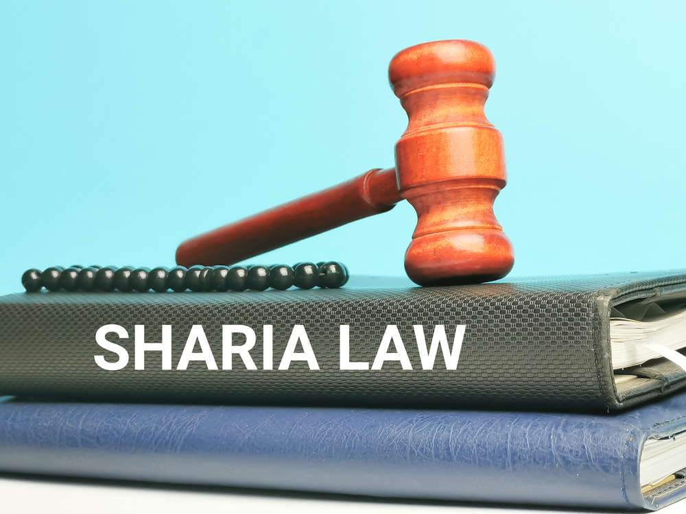Phrase,Sharia,Law,On,Books,With,Gavel,And,Prayer,Beads.