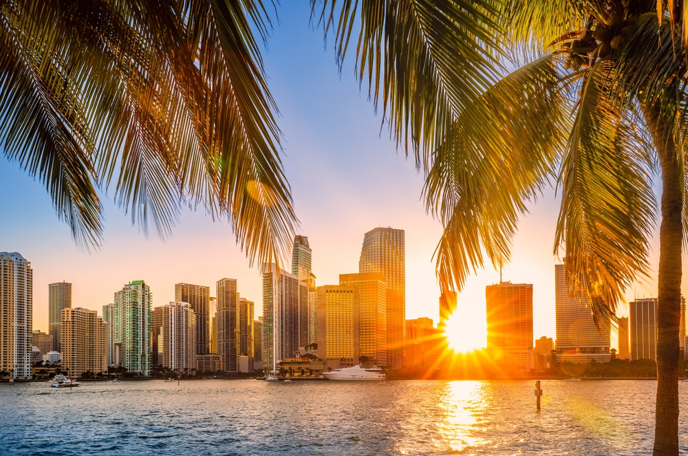 Miami,,Florida,Skyline,With,Sunbeams,Shining,Through,The,Skyscrapers.,Miami