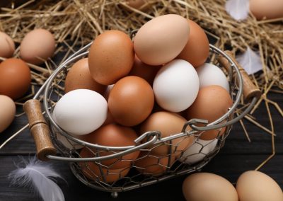 Florida Just Caught the Egg Companies That Robbed You at the Grocery Store and Made Them Pay Fresh,Chicken,Eggs,And,Dried,Straw,On,Black,Wooden,Table,