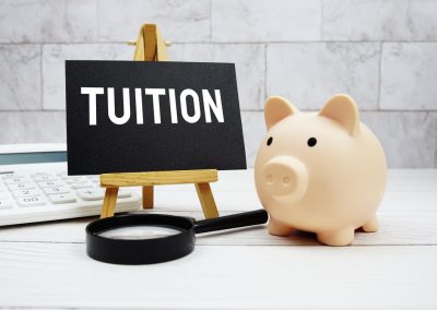 Tuition,Text,With,Piggy,Bank,,Calculator,And,Magnifying,Glass