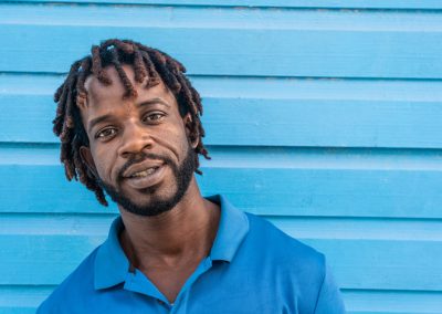 Dominican,Republic.,Close-up,Face,Of,Smiling,Young,African,American,Against
