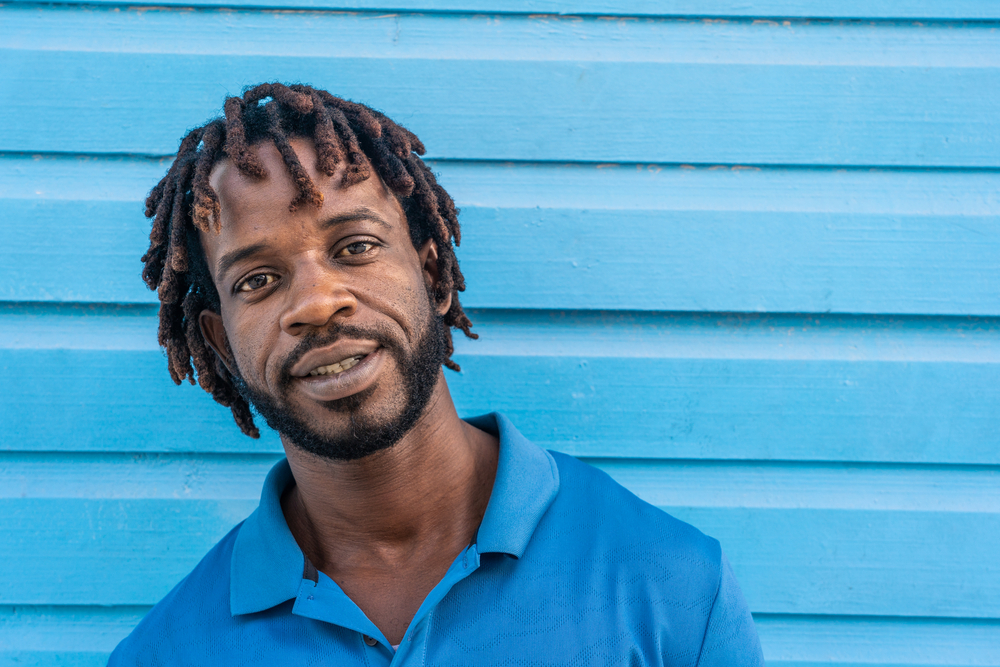Dominican,Republic.,Close-up,Face,Of,Smiling,Young,African,American,Against