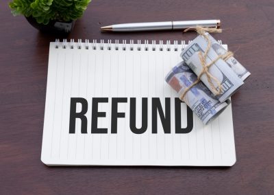 Refund,Notebook,Display,With,Cash