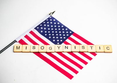 Florida’s AG Just Demanded a Teacher Be Fired After She Called an Eighth Grader a Misogynist A,View,Of,The,American,Flag,With,Misogynistic,Spelt,Across
