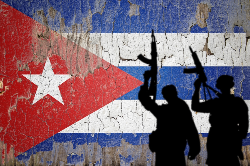 Flag,Of,Cuba,Painted,On,The,Cracked,Wall,With,Terrorist
